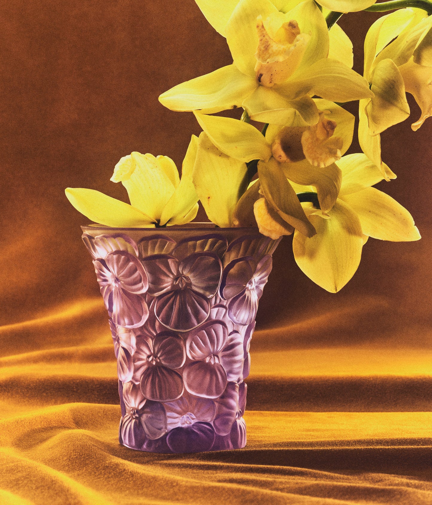 Mouth blown purple Murano vase with sculptural flowers.