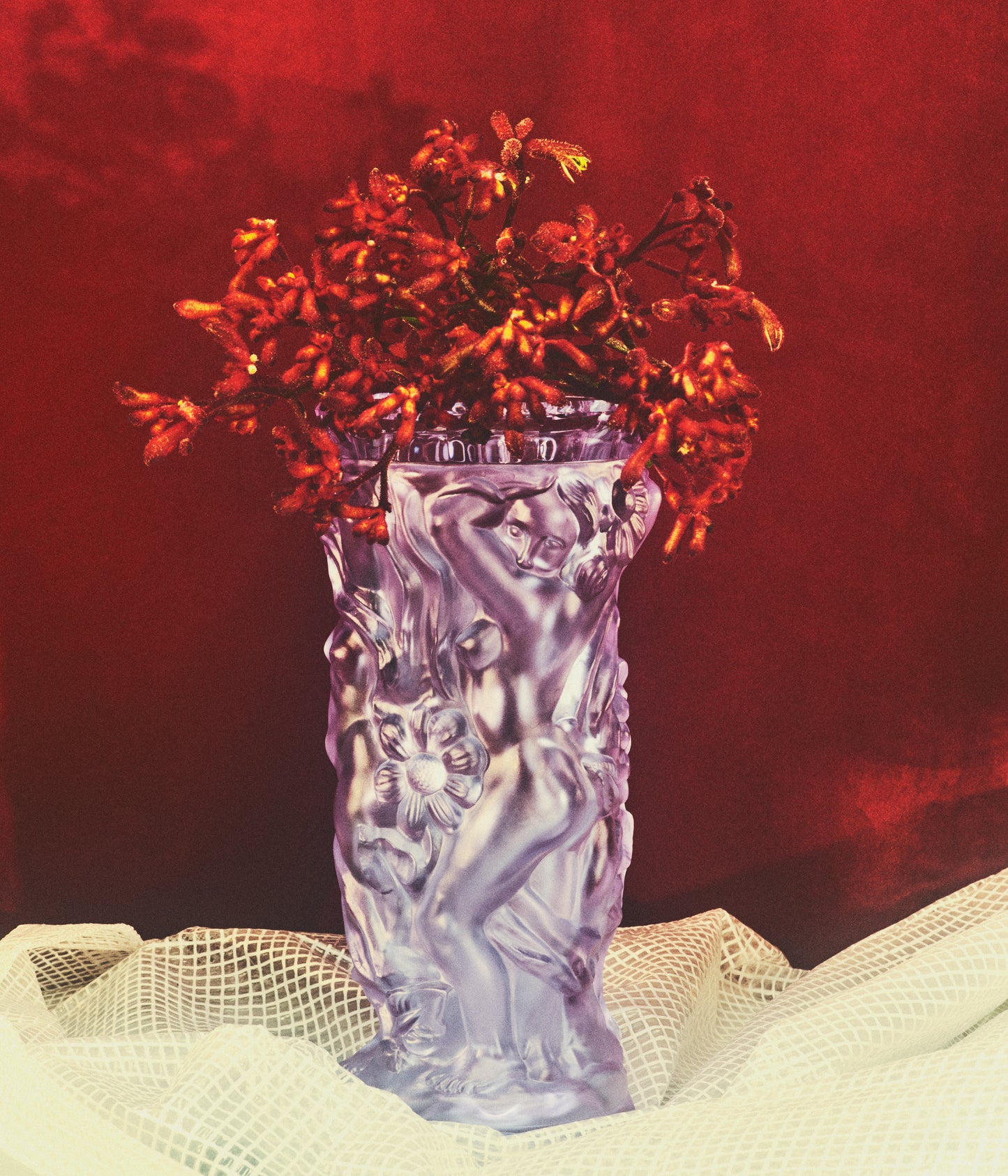 Mouth blown large purple Murano vase with sculptural flowers and women silhouettes.
