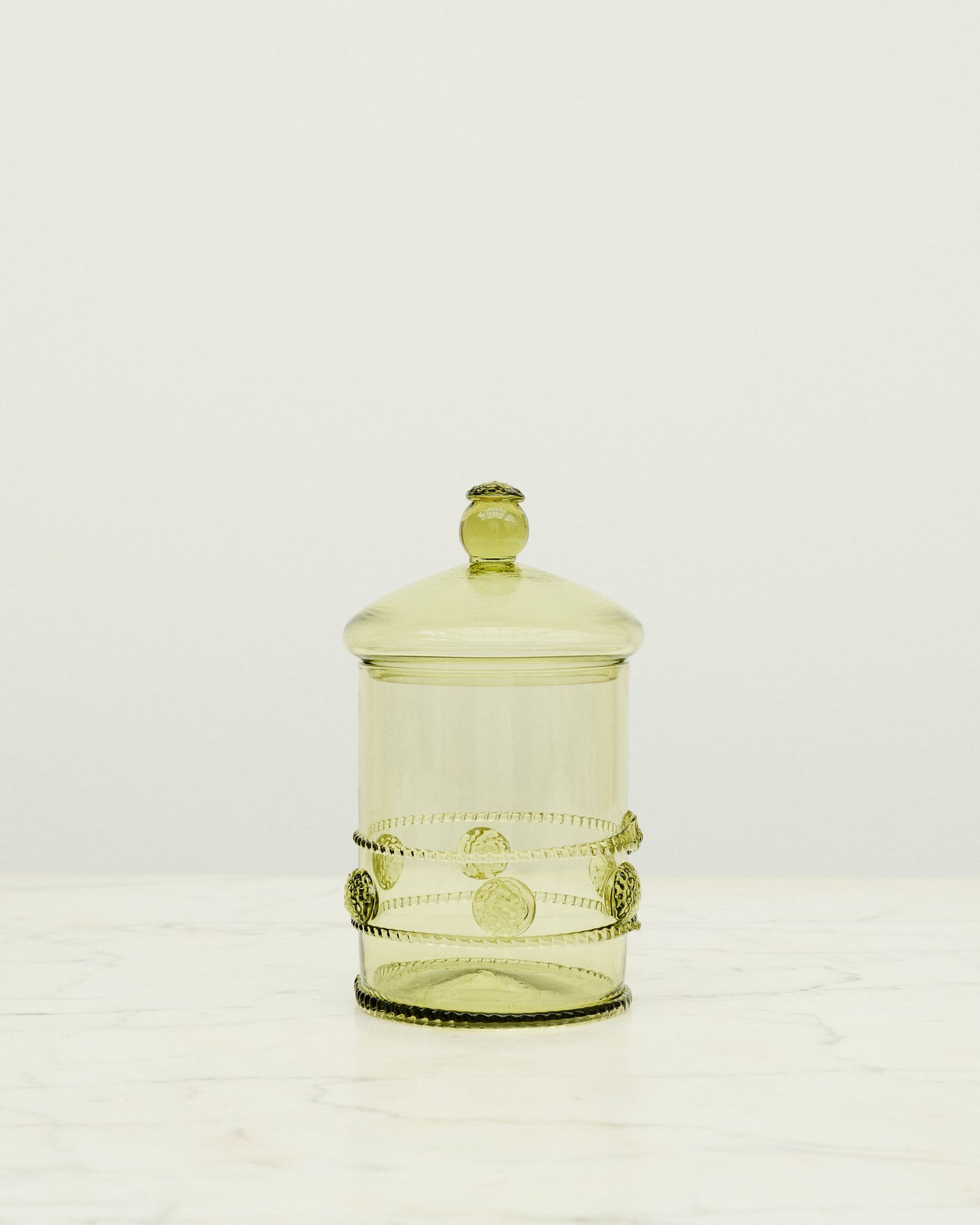 Green murano glass bonbonniere with dot details.