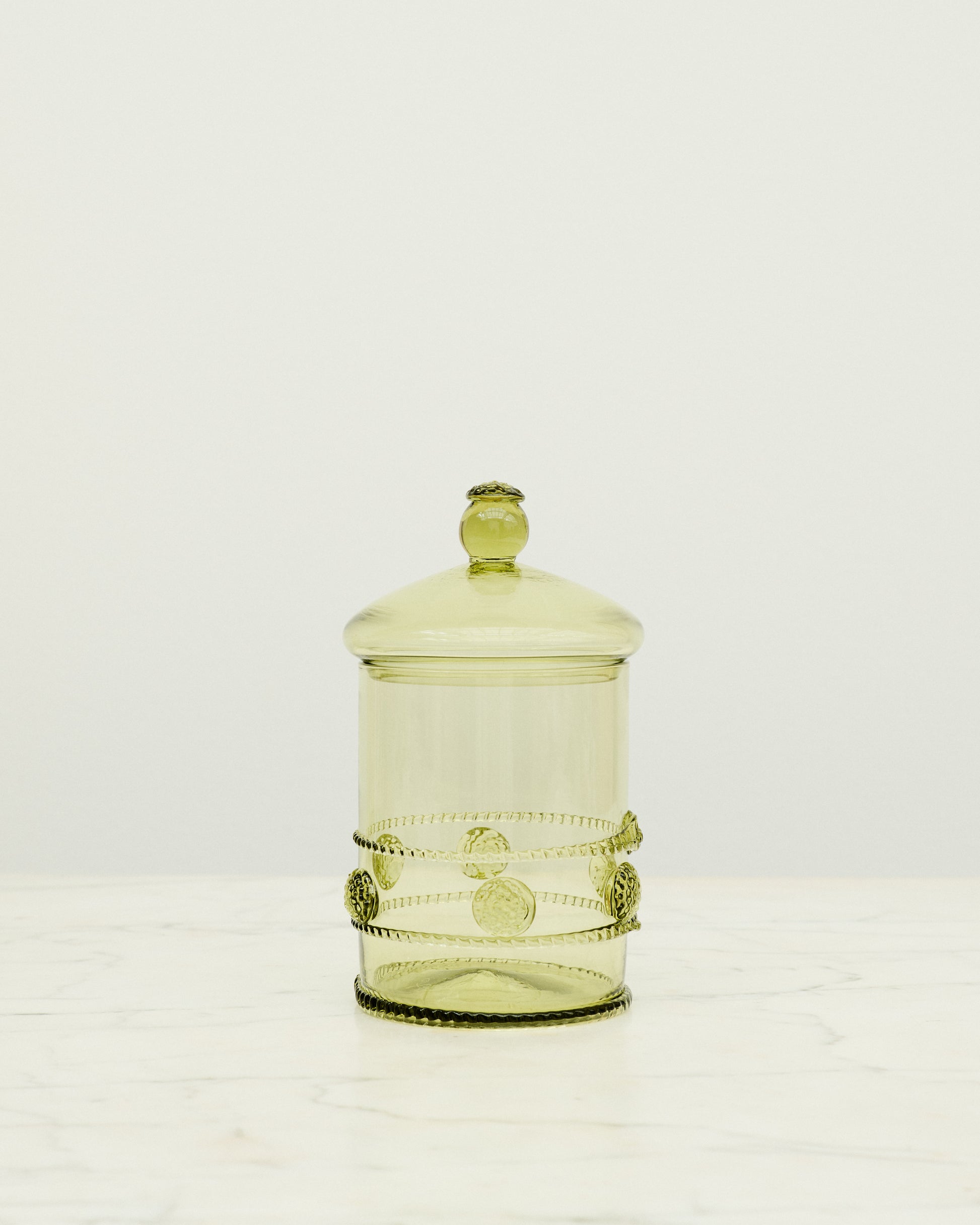 Green murano glass bonbonniere with dot details.