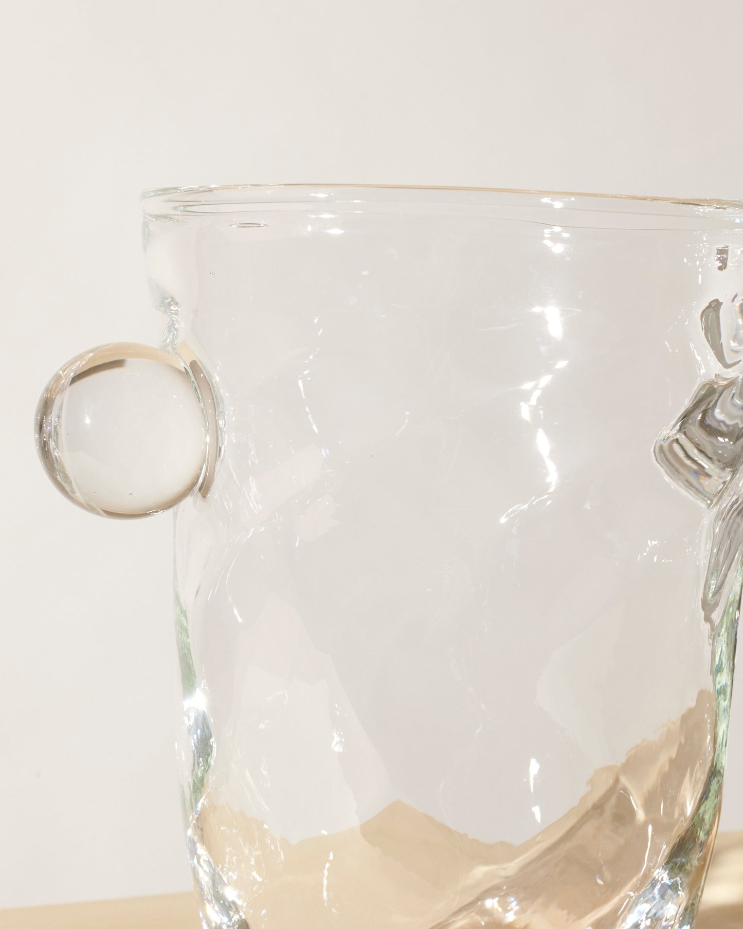 Akua Objects Glassware. Mouth blown and handmade Bohemian Glassware. Made in Bohemia. The Oliver vase is named after friend and muse of Akua Objects, Oliver Fussing. Different shapes meet and create a sculptural silhouette. The Oliver vase could have been born during the art deco period and act as a contemporary piece in Akua Object’s poetic universe. It takes four people to create each Oliver vase.