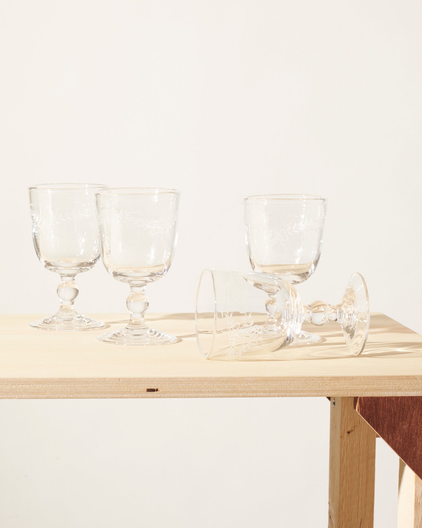 Akua Objects Glassware. Mouth blown and handmade Bohemian Glassware. Made in Bohemia. Add poetry to your table with Barbro water glasses. These contemporary interpreted glasses have been mouth blown with patterns added afterwards, patiently engraved by a master’s hand.