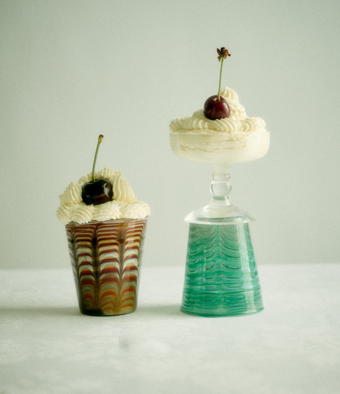 Akua Objects Glassware. Mouth blown and handmade Bohemian Glassware. Made in Bohemia. The Alban glasses convey a contemporary take on the poppy that has always been close to Annika’s heart. The glasses sometimes carry small bubbles of air, eternally capturing the breath of the glass blower.