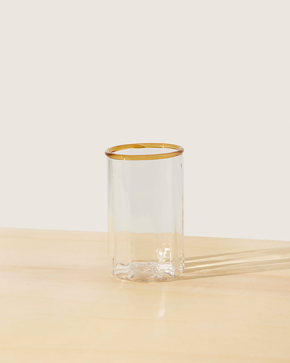 Akua Objects Glassware. Mouth blown and handmade Bohemian Glassware. Made in Bohemia. The Peter collection is a dedication to Annika’s grandfather, who made a great effort of gathering his children and grandchildren around an atmospheric dinner table. Glassware with a rim has always been present in the home of Peter’s and is a timeless classic that will be found in homes for many generations to come.