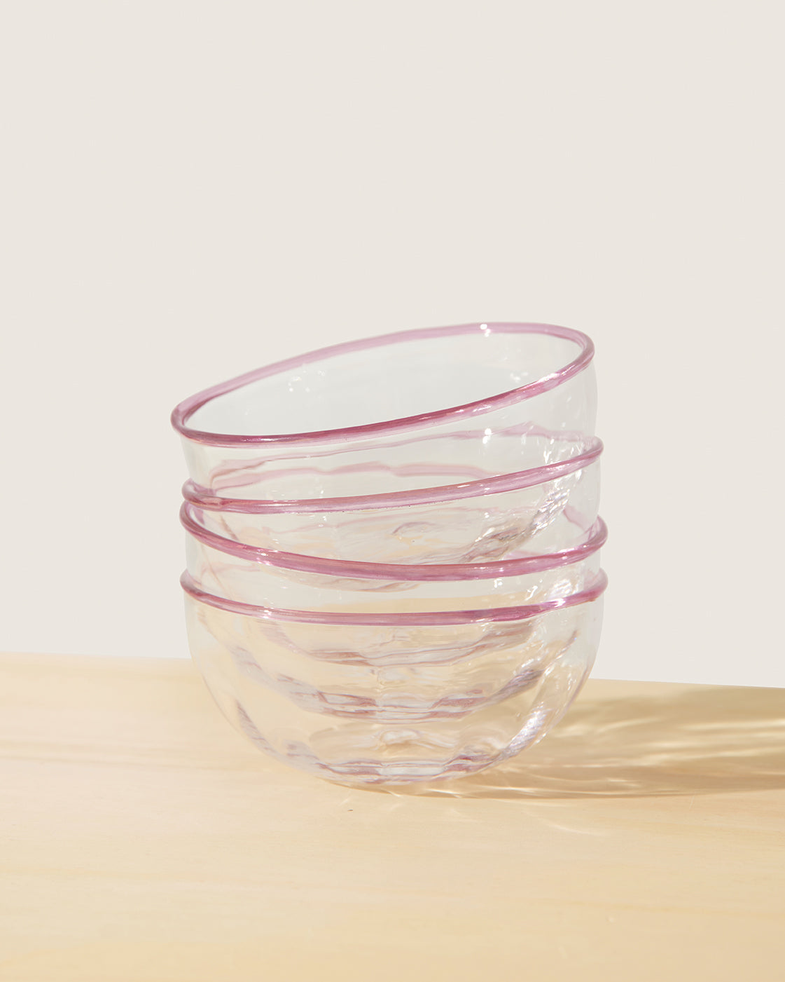 Akua Objects Glassware. Mouth blown and handmade Bohemian Glassware. Made in Bohemia. The Peter collection is a dedication to Annika’s grandfather, who made a great effort of gathering his children and grandchildren around an atmospheric dinner table. Glassware with a rim has always been present in the home of Peter’s and is a timeless classic that will be found in homes for many generations to come.