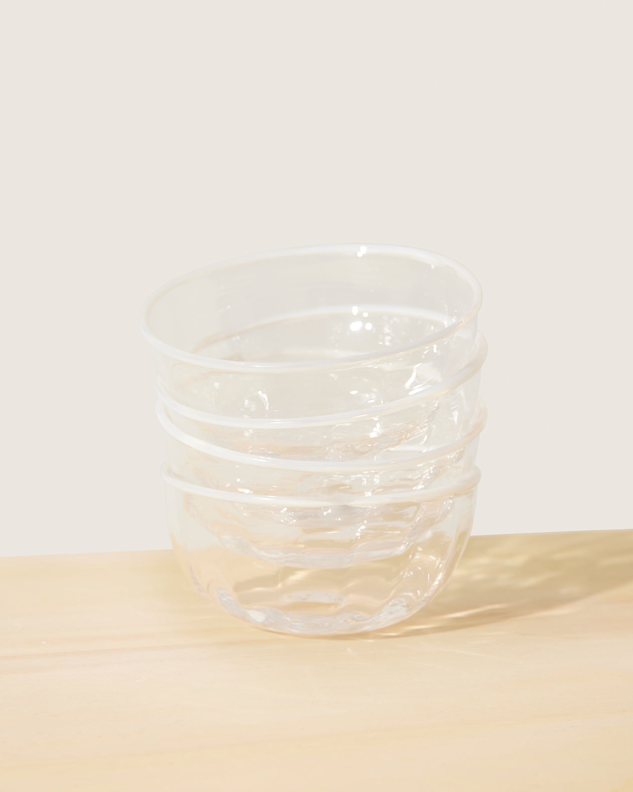 Akua Objects Glassware. Mouth blown and handmade Bohemian Glassware. Made in Bohemia. The Peter collection is a dedication to Annika’s grandfather, who made a great effort of gathering his children and grandchildren around an atmospheric dinner table. Glassware with a rim has always been present in the home of Peter’s and is a timeless classic that will be found in homes for many generations to come.