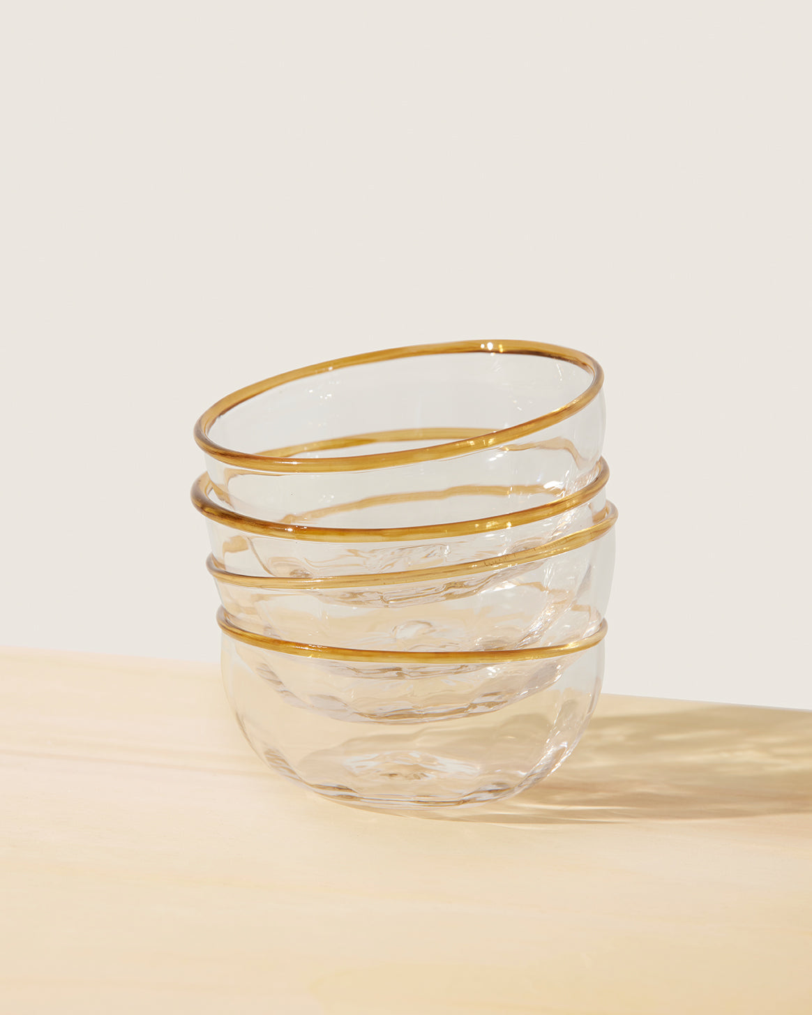 Akua Objects Glassware. Mouth blown and handmade Bohemian Glassware. Made in Bohemia. The Peter collection is a dedication to Annika’s grandfather, who made a great effort of gathering his children and grandchildren around an atmospheric dinner table. Glassware with a rim has always been present in the home of Peter’s and is a timeless classic that will be found in homes for many generations to come.