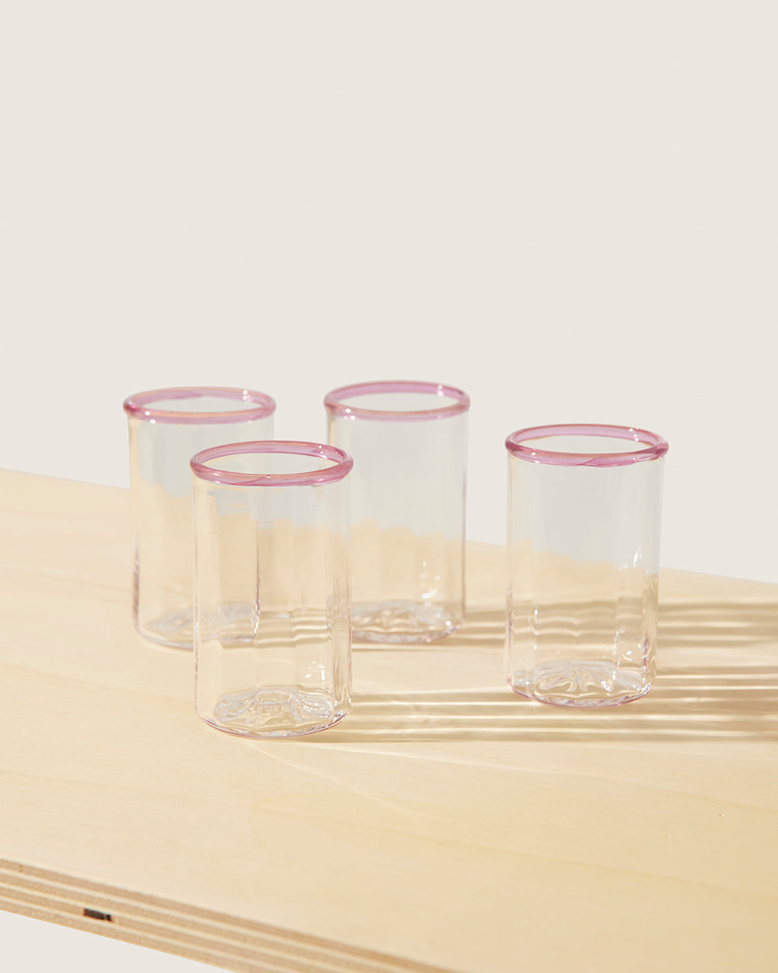 Akua Objects Glassware. Mouth blown and handmade Bohemian Glassware. Made in Bohemia. The Peter collection is a dedication to Annika’s grandfather, who made a great effort of gathering his children and grandchildren around an atmospheric dinner table. Glassware with a rim has always been present in the home of Peter’s and is a timeless classic that will be found in homes for many generations to come.