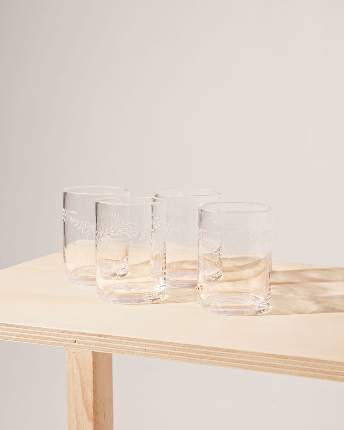 Akua Objects Glassware. Mouth blown and handmade Bohemian Glassware. Made in Bohemia. Add poetry to your table with Barbro water glasses. These contemporary interpreted glasses have been mouth blown with patterns added afterwards, patiently engraved by a master’s hand.