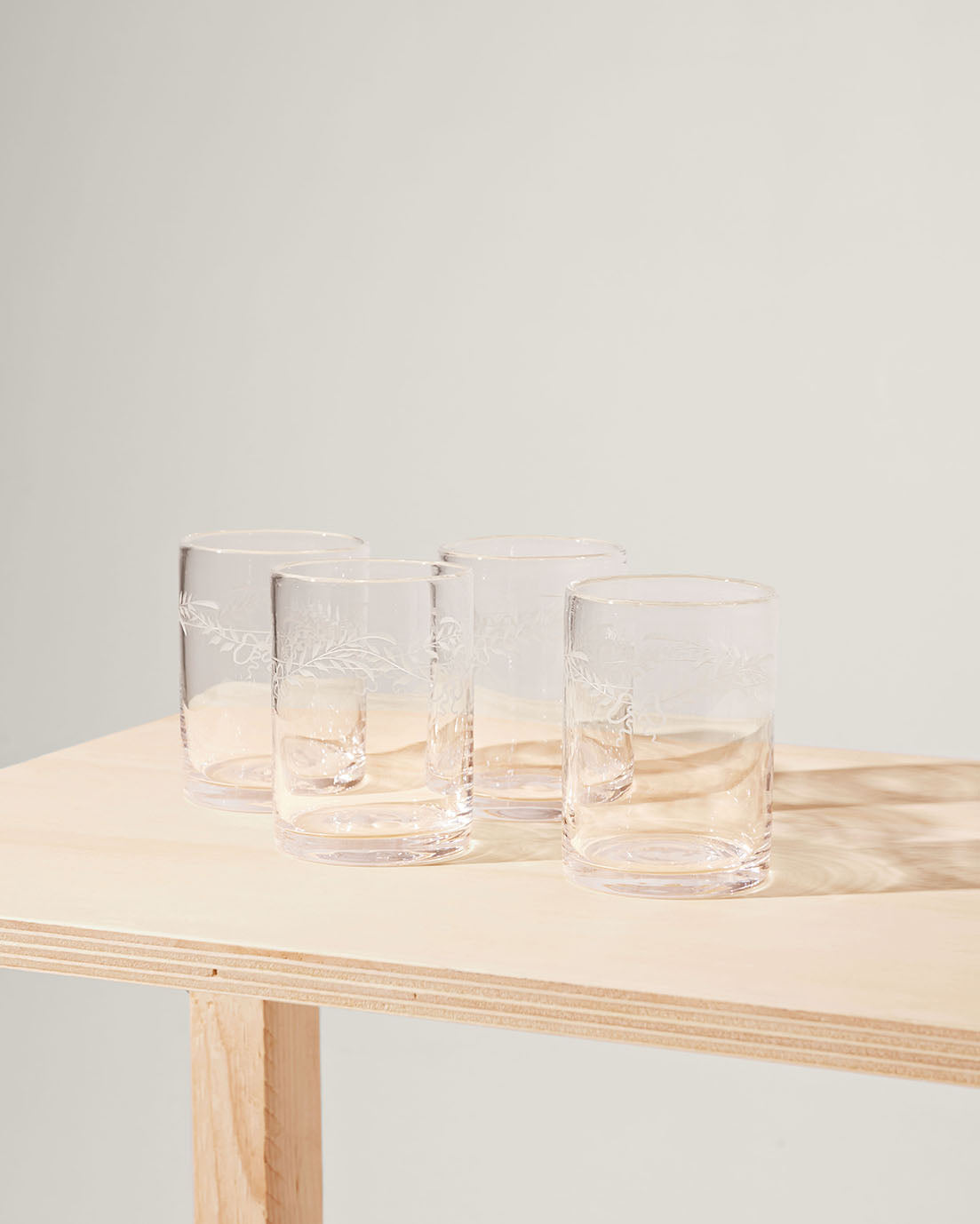 Akua Objects Glassware. Mouth blown and handmade Bohemian Glassware. Made in Bohemia. Add poetry to your table with Barbro water glasses. These contemporary interpreted glasses have been mouth blown with patterns added afterwards, patiently engraved by a master’s hand.