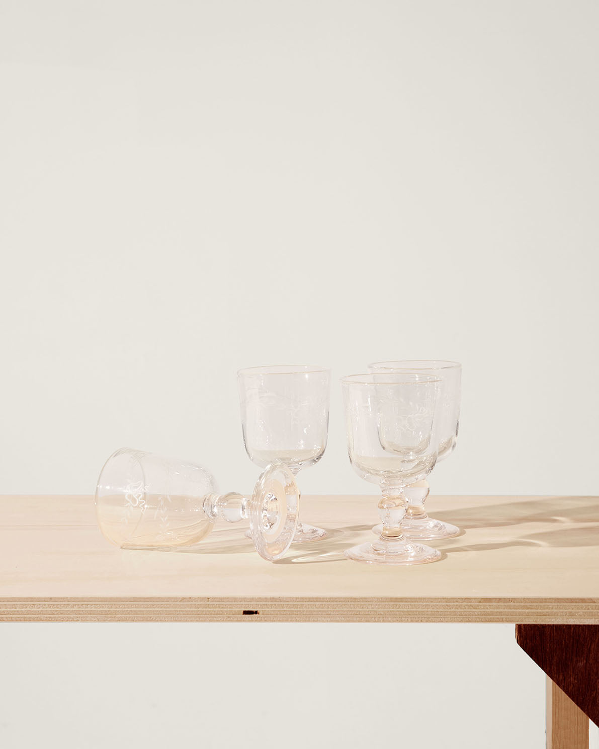 Akua Objects Glassware. Mouth blown and handmade Bohemian Glassware. Made in Bohemia. Add poetry to your table with Barbro water glasses. These contemporary interpreted glasses have been mouth blown with patterns added afterwards, patiently engraved by a master’s hand.