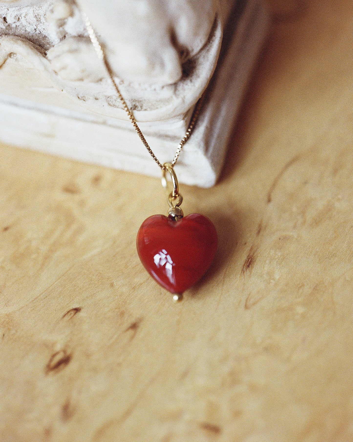 Akua Objects Glassware. Mouth blown and handmade Venetian Glassware. Made in Murano. Every glass heart is handmade and available in the colours red and blue. The Uma pendant is named after Josefine's first born daughter. When Annika was the same age as Uma, she travelled to Venice with her parents, and it was in the city of love her passion for glass was born.