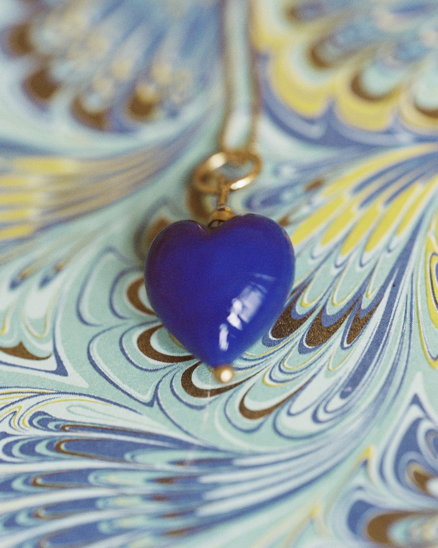 Akua Objects Glassware. Mouth blown and handmade Venetian Glassware. Made in Murano. Every glass heart is handmade and available in the colours red and blue. The Uma pendant is named after Josefine's first born daughter. When Annika was the same age as Uma, she travelled to Venice with her parents, and it was in the city of love her passion for glass was born.