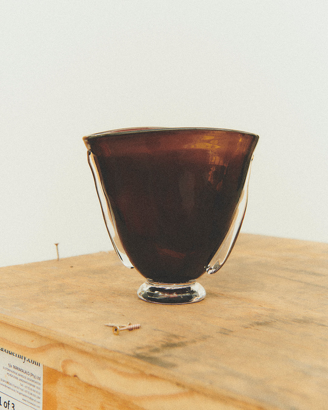 Akua Objects Glassware. Mouth blown and handmade Bohemian Glassware. Made in Bohemia. The Oliver vase is named after friend and muse of Akua Objects, Oliver Fussing. Different shapes meet and create a sculptural silhouette. The Oliver vase could have been born during the art deco period and act as a contemporary piece in Akua Object’s poetic universe. It takes four people to create each Oliver vase.