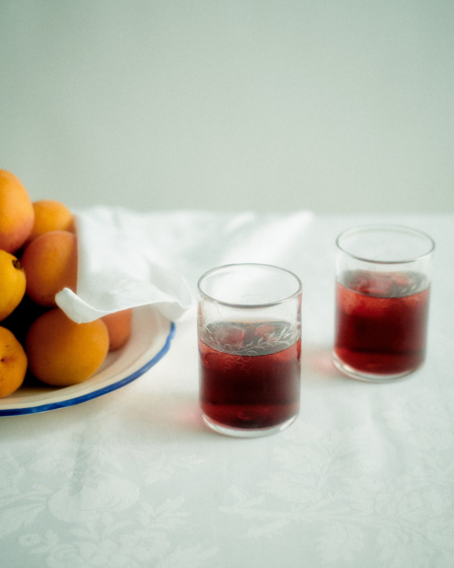 Akua Objects Glassware. Mouth blown and handmade Bohemian Glassware. Made in Bohemia. Add poetry to your table with Barbro water glasses. These contemporary interpreted glasses have been mouth blown with patterns added afterwards, patiently engraved by a master’s hand.