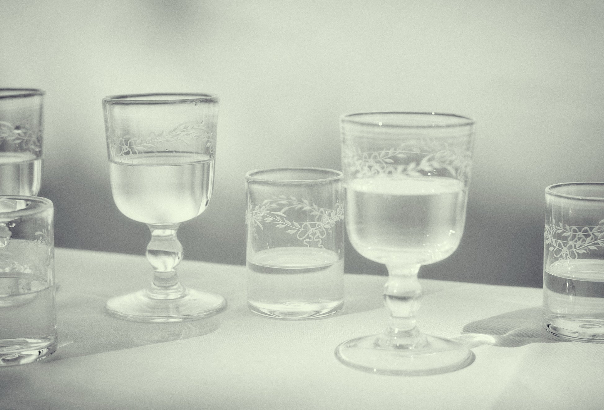 Akua Objects Glassware. Mouth blown and handmade Bohemian Glassware. Made in Bohemia. Add poetry to your table with Barbro water glasses. These contemporary interpreted glasses have been mouth blown with patterns added afterwards, patiently engraved by a master’s hand.