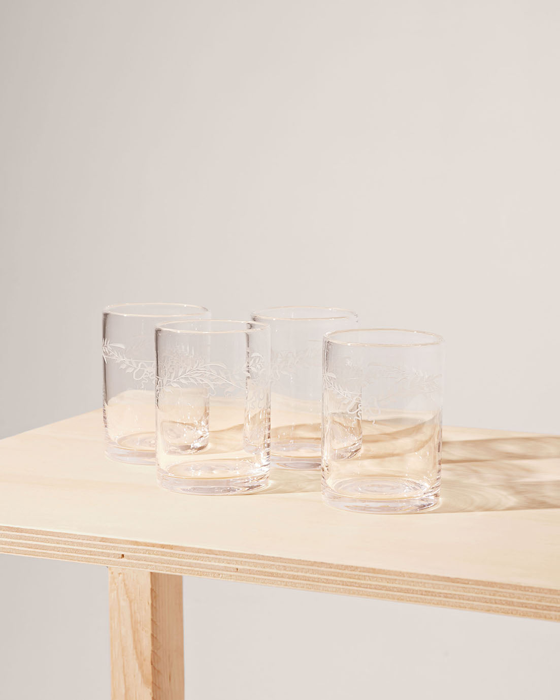 Akua Objects Glassware. Mouth blown and handmade Bohemian Glassware. Made in Bohemia. Add poetry to your table with Barbro water glasses. These contemporary interpreted glasses have been mouth blown with patterns added afterwards, patiently engraved by a master’s hand.