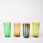 Set of 4 striped handmade Murano glasses in blue, brown, green, pink and yellow.
